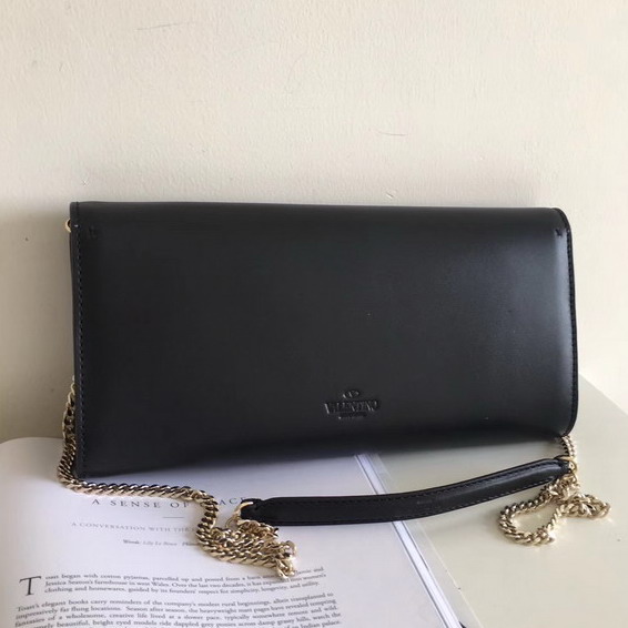 Valentino Garavani Demilune Clutch in Black Soft Full Grain Calfskin Leather with a Natural Hand and Shiny Finishing For Sale