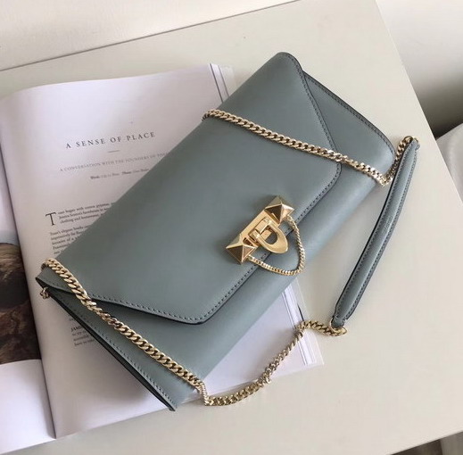 Valentino Garavani Demilune Clutch in Light Blue Soft Full Grain Calfskin Leather with a Natural Hand and Shiny Finishing For Sale