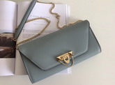 Valentino Garavani Demilune Clutch in Light Blue Soft Full Grain Calfskin Leather with a Natural Hand and Shiny Finishing For Sale