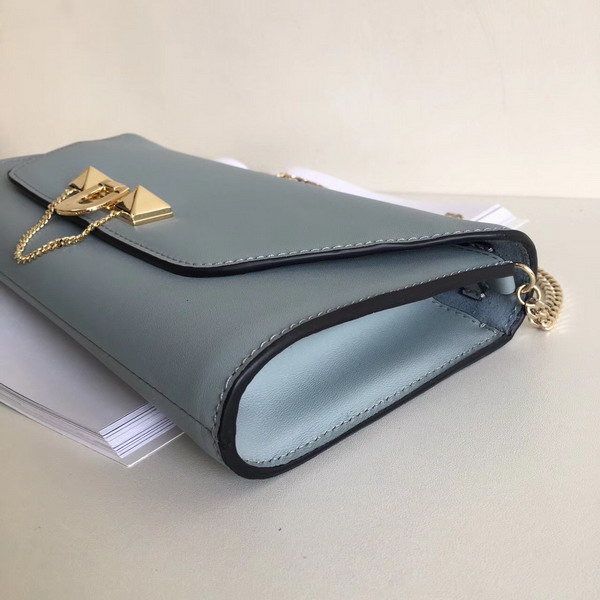 Valentino Garavani Demilune Clutch in Light Blue Soft Full Grain Calfskin Leather with a Natural Hand and Shiny Finishing For Sale