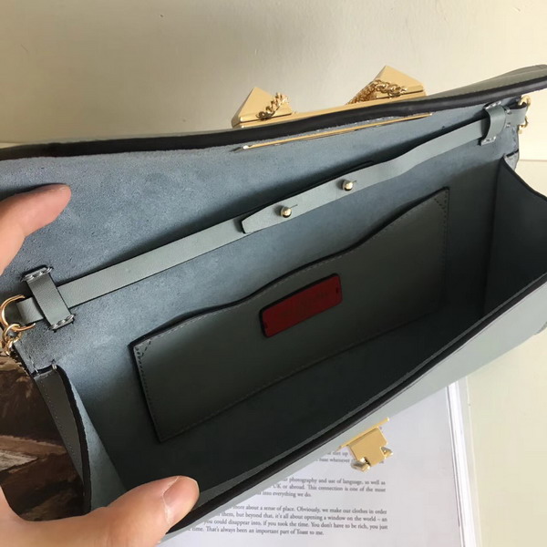 Valentino Garavani Demilune Clutch in Light Blue Soft Full Grain Calfskin Leather with a Natural Hand and Shiny Finishing For Sale