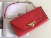 Valentino Garavani Demilune Clutch in Red Soft Full Grain Calfskin Leather with a Natural Hand and Shiny Finishing For Sale