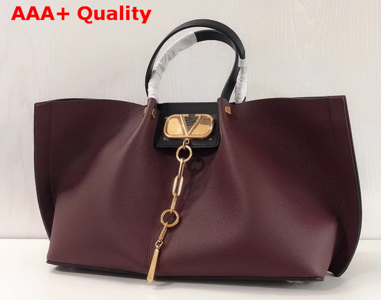 Valentino Garavani Medium Vlogo Escape Grainy Calfskin Shopper in Burgundy Replica