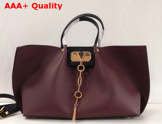 Valentino Garavani Medium Vlogo Escape Grainy Calfskin Shopper in Burgundy Replica