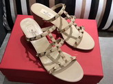 Valentino Garavani Rockstud Calfskin Sandal in Nude with Platinum Finish Studs Heel Height 60mm For Sale