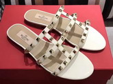 Valentino Garavani Rockstud Calfskin Slide Sandal in Beige with Platinum Finish Studs Heel Height 5mm For Sale