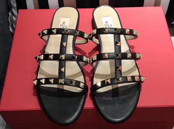 Valentino Garavani Rockstud Calfskin Slide Sandal in Black with Platinum Finish Studs Heel Height 5mm For Sale