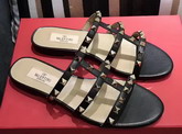 Valentino Garavani Rockstud Calfskin Slide Sandal in Black with Platinum Finish Studs Heel Height 5mm For Sale