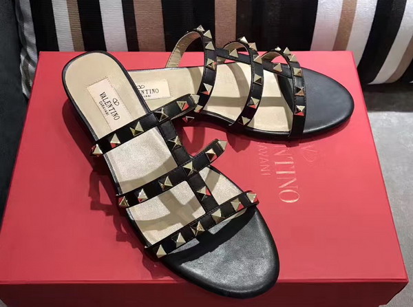 Valentino Garavani Rockstud Calfskin Slide Sandal in Black with Platinum Finish Studs Heel Height 5mm For Sale