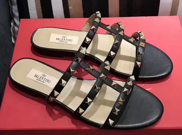 Valentino Garavani Rockstud Calfskin Slide Sandal in Black with Platinum Finish Studs Heel Height 5mm For Sale