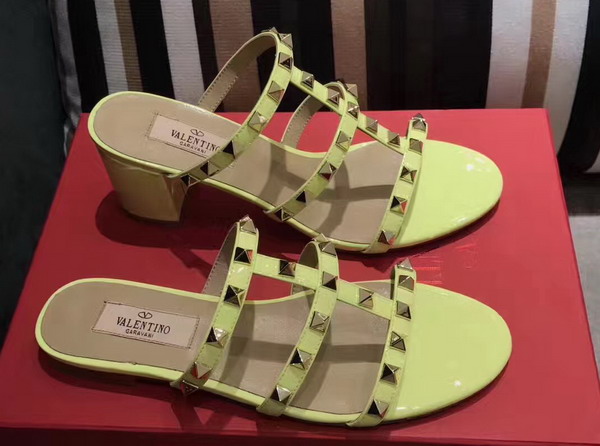 Valentino Garavani Rockstud Calfskin Slide Sandal in Yellow with Platinum Finish Studs Heel Height 5mm For Sale