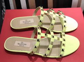 Valentino Garavani Rockstud Calfskin Slide Sandal in Yellow with Platinum Finish Studs Heel Height 5mm For Sale