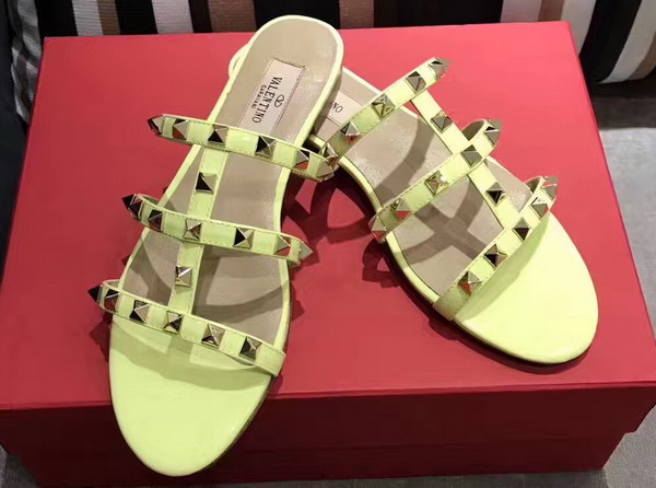 Valentino Garavani Rockstud Calfskin Slide Sandal in Yellow with Platinum Finish Studs Heel Height 5mm For Sale