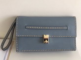 Valentino Garavani Rockstud Clutch in Sky Blue Nappa Leather For Sale