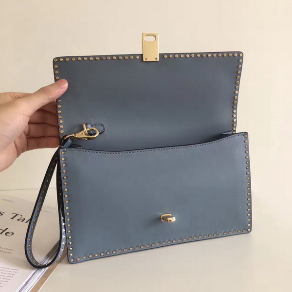 Valentino Garavani Rockstud Clutch in Sky Blue Nappa Leather For Sale