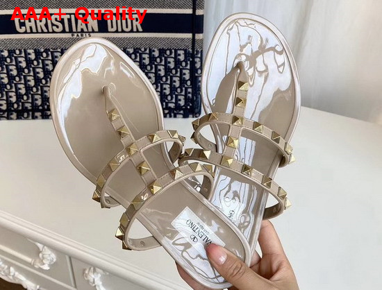 Valentino Garavani Rockstud Flat Rubber Sandal in Nude Replica