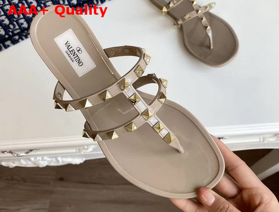 Valentino Garavani Rockstud Flat Rubber Sandal in Nude Replica