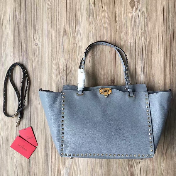 Valentino Garavani Rockstud Medium Tote in Light Blue Stampa Alce Textured Calfskin Platinum Finish Metal Studs and Hardware For Sale