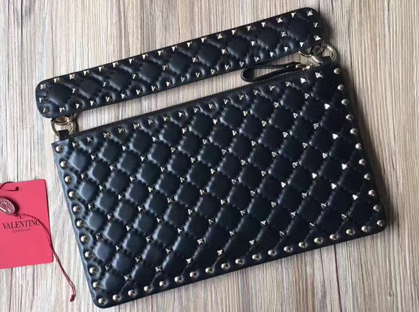 Valentino Garavani Rockstud Spike Clutch in Black Lambskin For Sale