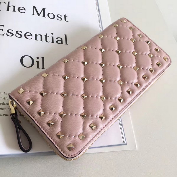 Valentino Garavani Rockstud Spike Zip Continental Wallet in Pastel Pink Soft Lambskin Leather For Sale