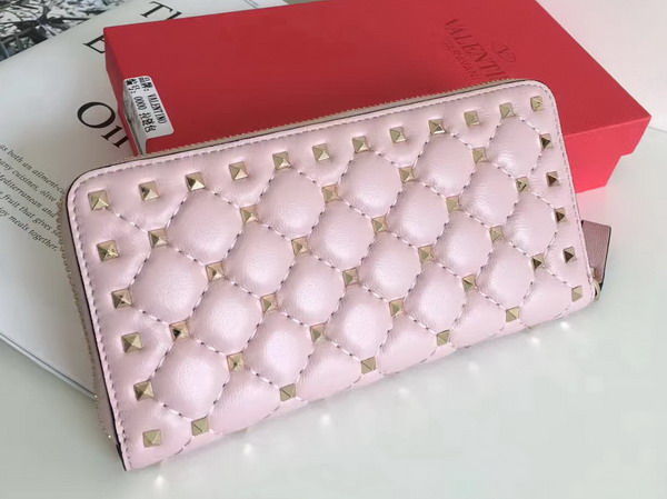 Valentino Garavani Rockstud Spike Zip Continental Wallet in Pastel Pink Soft Lambskin Leather For Sale