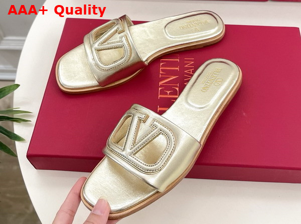 Valentino Garavani VLogo Cut Out Laminated Nappa Leather Silde Sandal in Platinum Antique Brass Replica